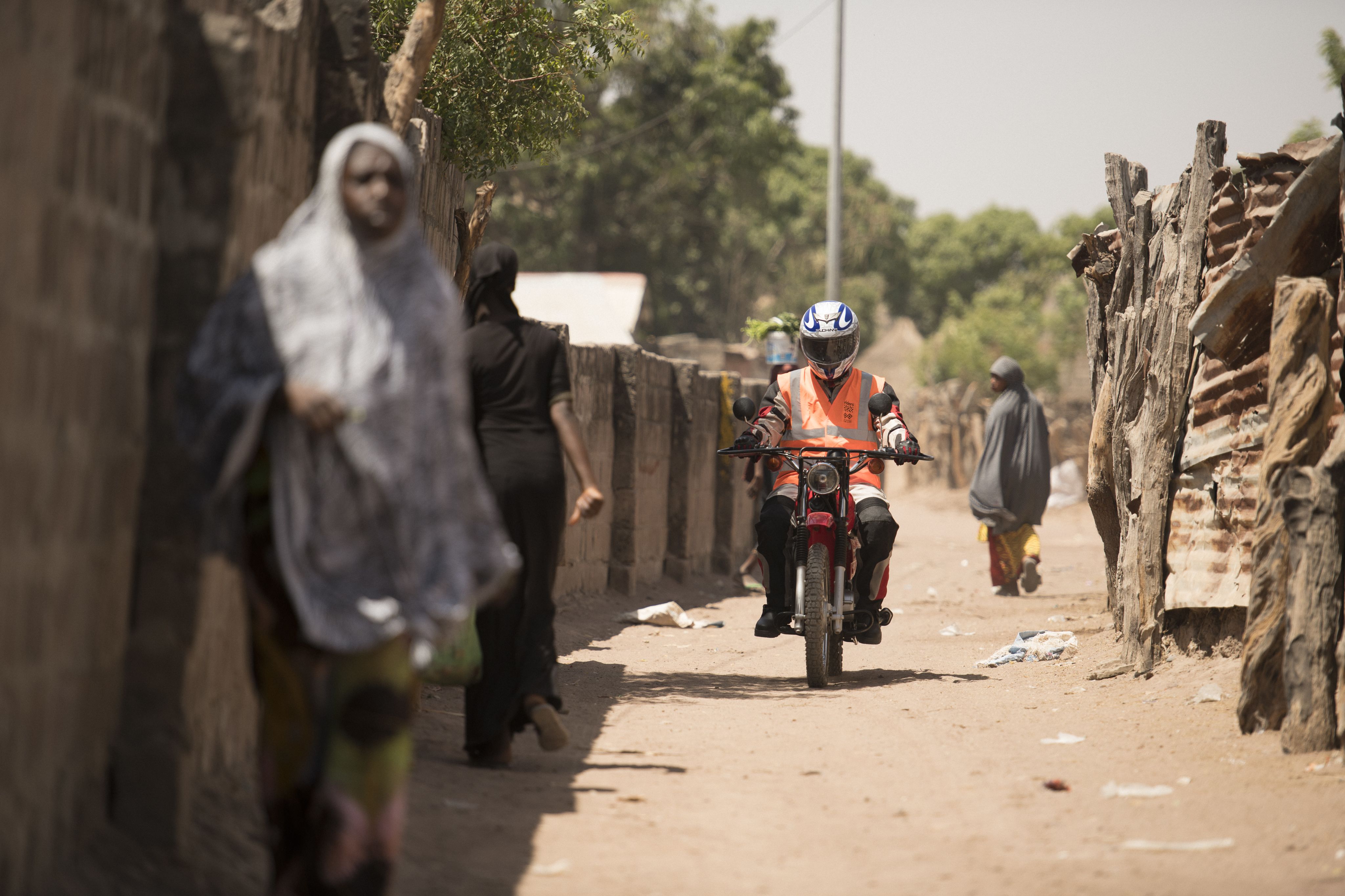 A Rider for Health during outreach work in The Gambia